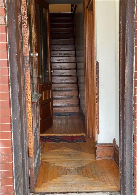 front foyer and stairway leading to 2nd floor hall
