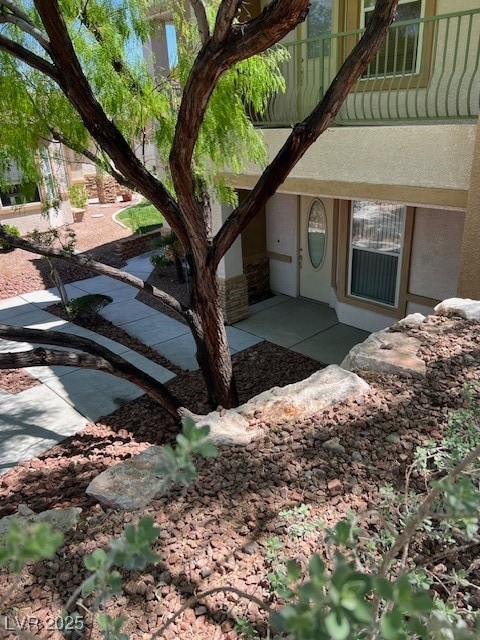 View of side of property featuring  private area t