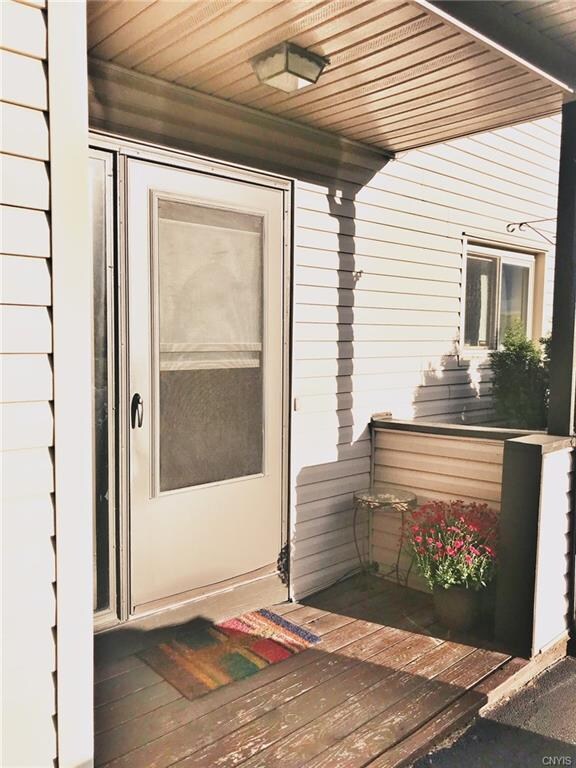 Adorable, bright front porch!