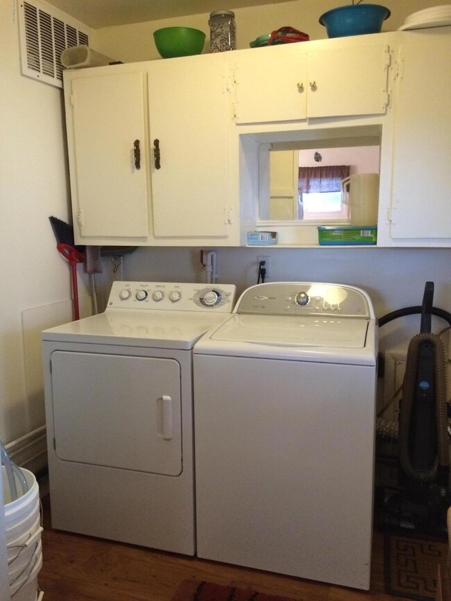 Laundry room with nice storage