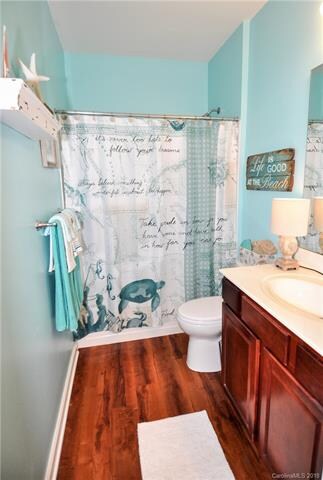 Bathroom to the right of entry hall and just outsi