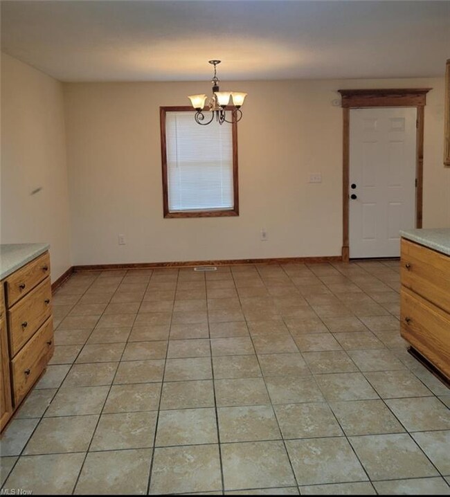 View from kitchen looking into the dining space an