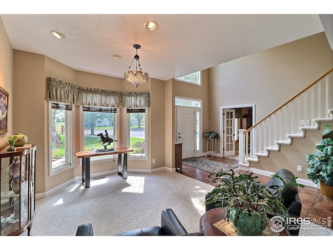 Front Entryway Opens to this Lovely Living Room Area
