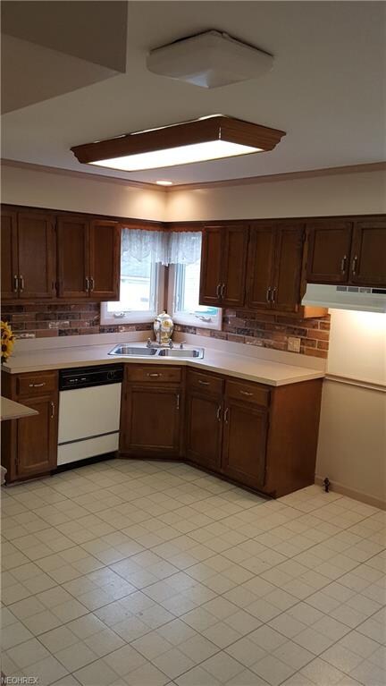 Who doesn't love a window above the kitchen sink?!