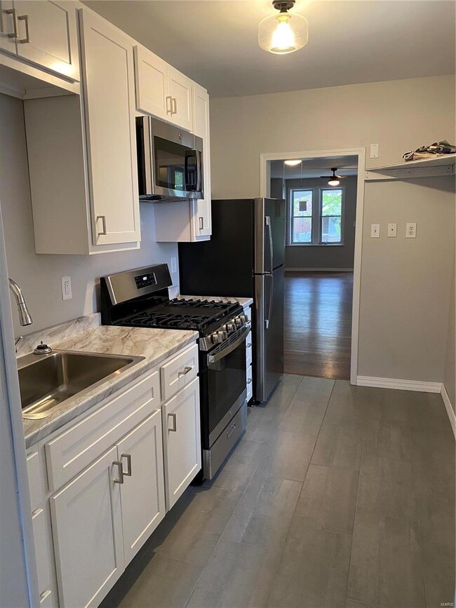 5313 Sutherland Ave, Saint Louis, MO 63109 - photo 5