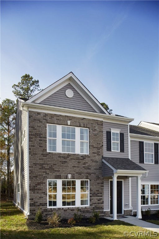 Example: Maple exterior. The Maple (D1) is an end unit townhome.