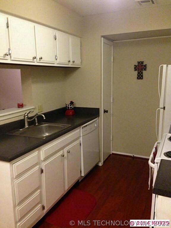 New countertops and flooring in kitchen and dining