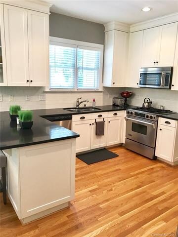 Beautiful kitchen with granite and gas stove....