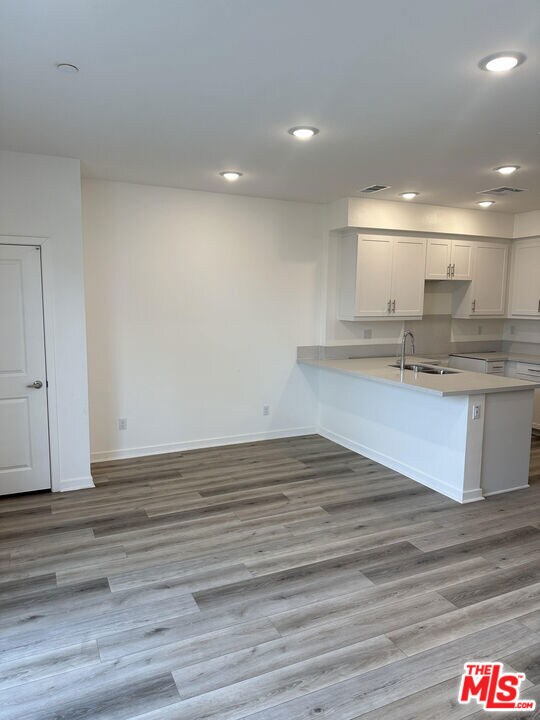 Homesite B3 great room with upgraded flooring and