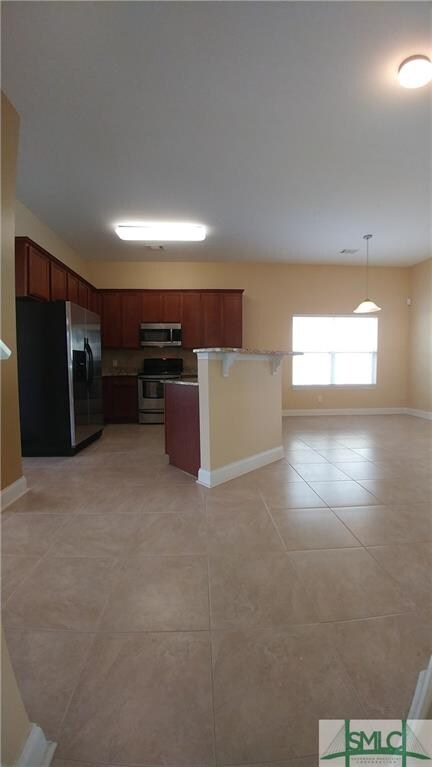Large modern kitchen which includes all stainless 