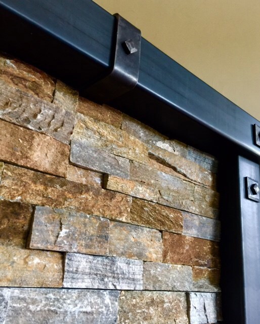 Ledgestone with custom ironwork.