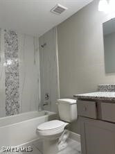 Full bathroom with visible vents, toilet, shower /