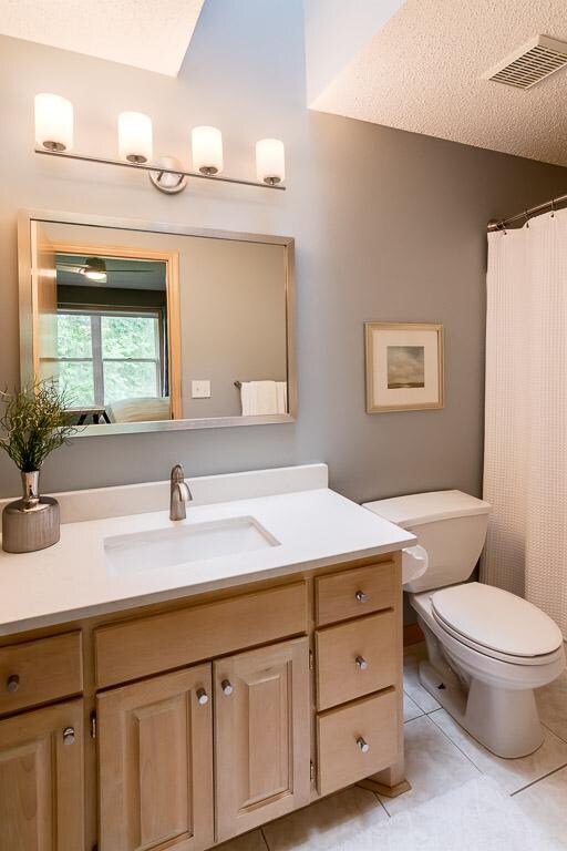 Private full master bathroom with skylight