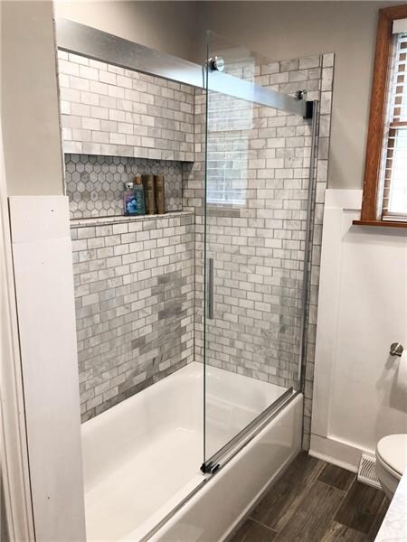 Custom tile shower with full length toiletry niche