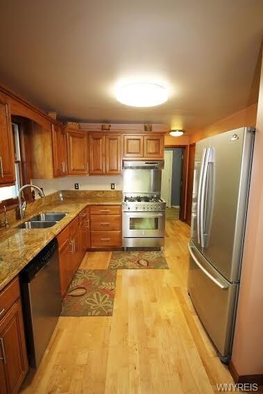 Custom cherry kitchen features granite countertops