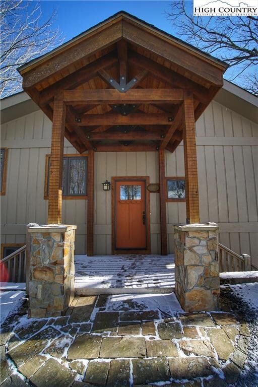 Stone pillars and timber frame entrance