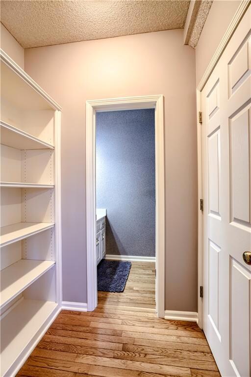 Built-in bookshelves in half bath.