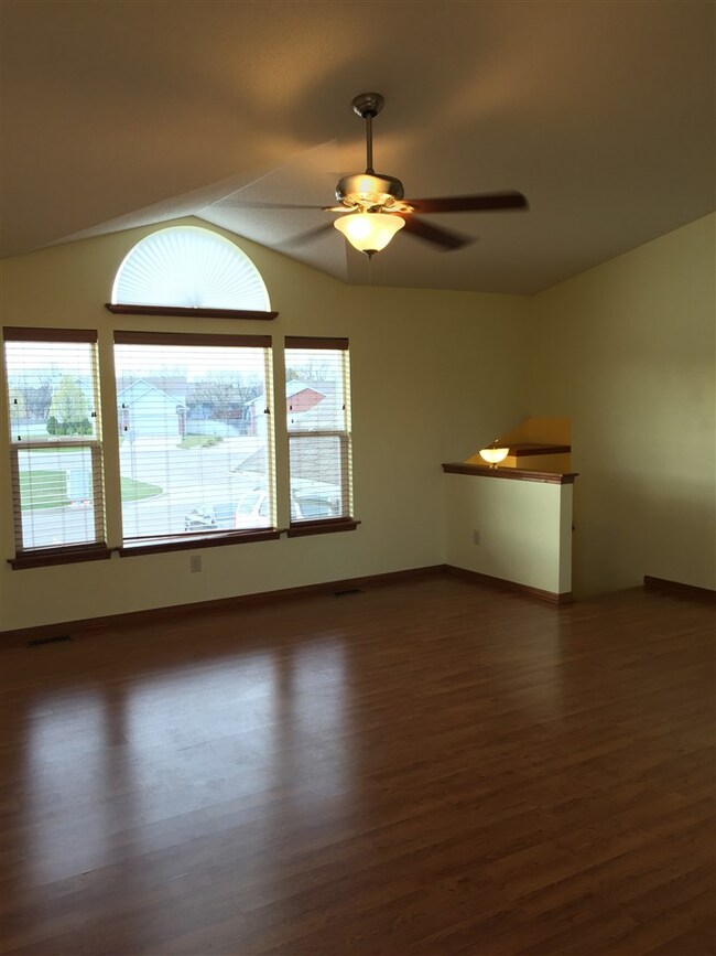 18' x 14', Wood Laminate Flooring, Vaulted Ceiling