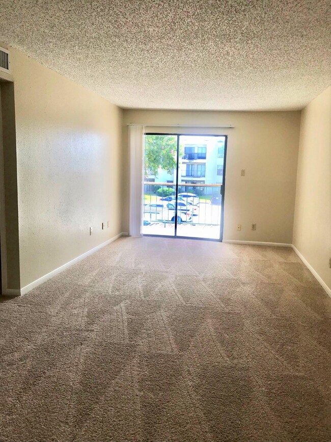 View of dining/living room from front door.