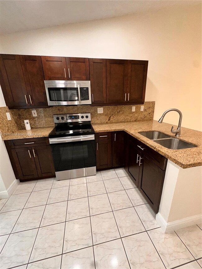 7191 W 24th Ave unit 5PH8, Hialeah, FL 33016 - photo 5