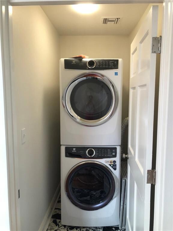 NEW stackable washer and dryer