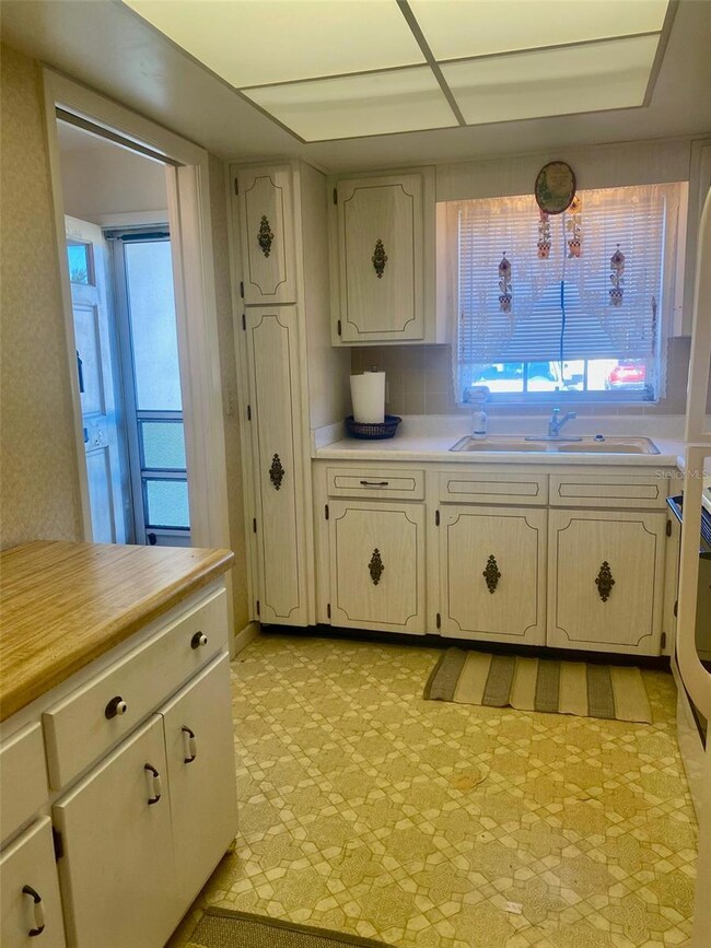 Kitchen has linoleum