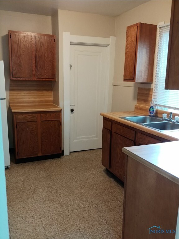 Kitchen - door leads to bsmt & side door