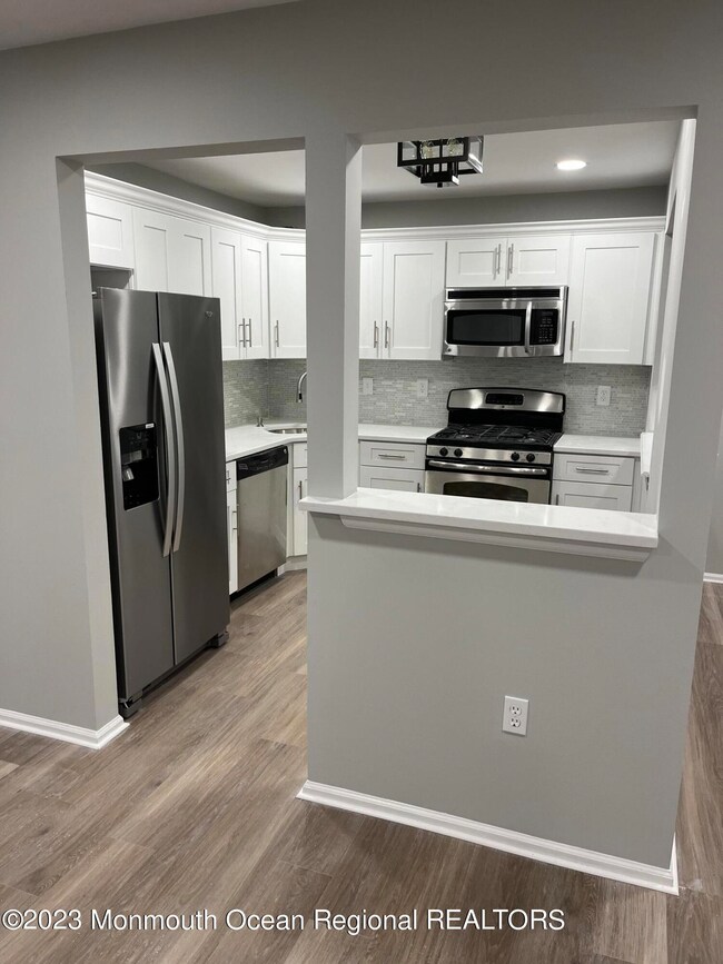 73 Players Cir unit A1, Tinton Falls, NJ 07724 - photo 2