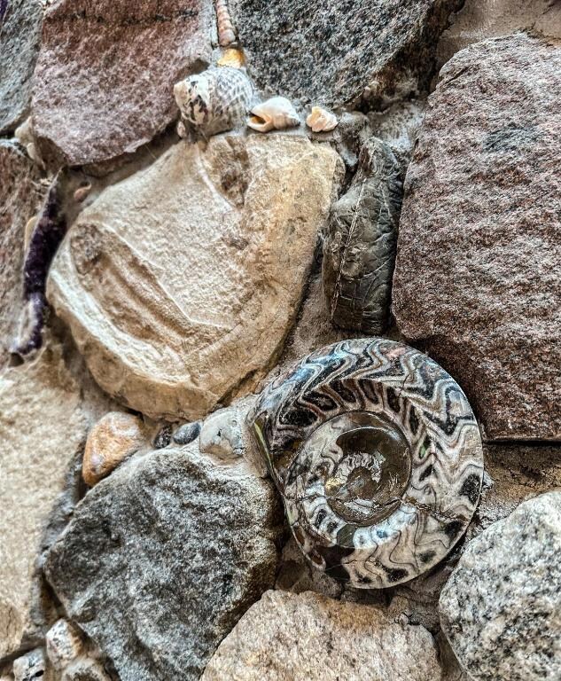 Fireplace/Chimney Detail - It Is Filled With Shells and Crystals As Well As Unique Stones