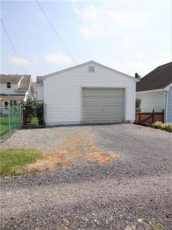Garage access by the alley behind the home