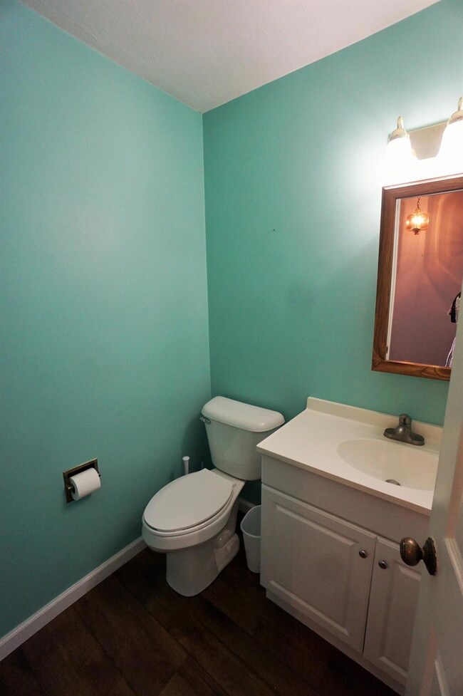 Half bath on the main floor of unit 7018.