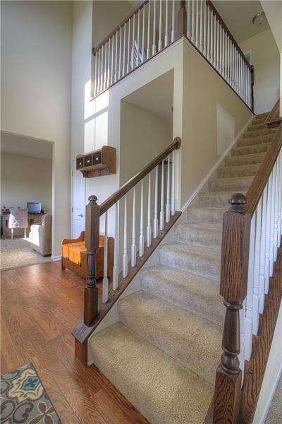 The Two-Story Foyer offers hardwood laminate and a