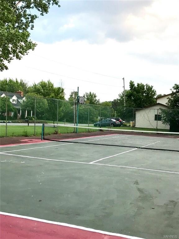 Tennis court fully fenced in