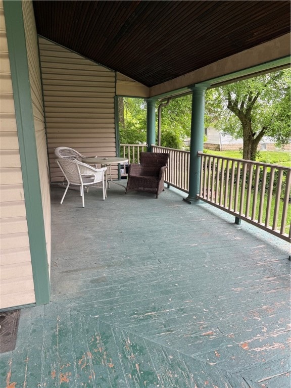 The wrap around porch extends to the side of the h