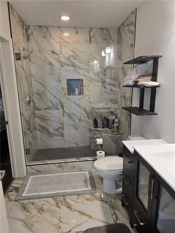 Full bathroom featuring marble tiled floors, a marble finish shower, vanity, and recessed lighting