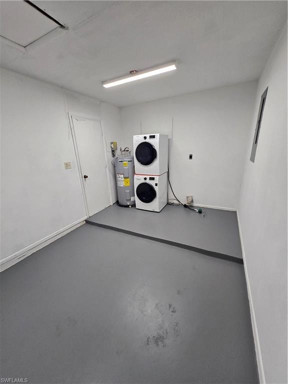 Garage with estacked washer and dryer and water heater