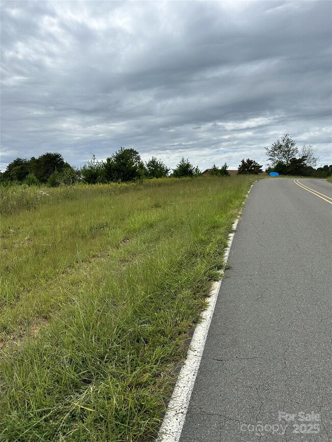 TRACT 1 on the left side of the road coming the opposite direction.