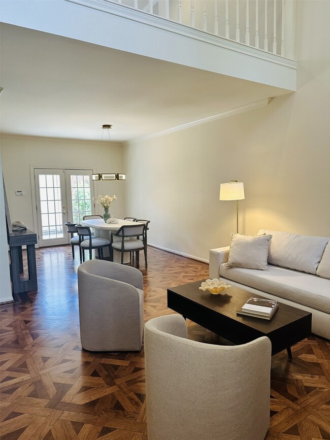 Spacious open-concept living and dining area with