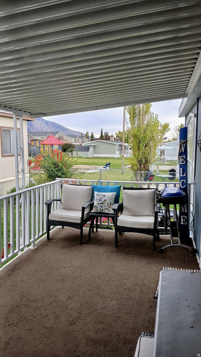 View of patio featuring a mountain view