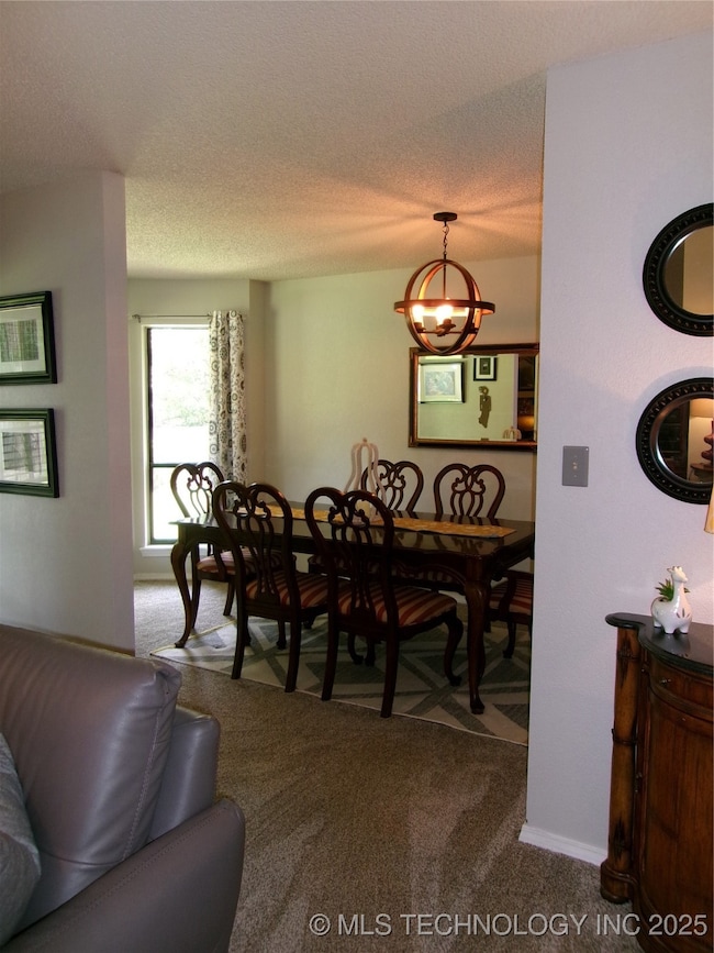 LOOKING INTO DINING AREA FROM LIVING AREA