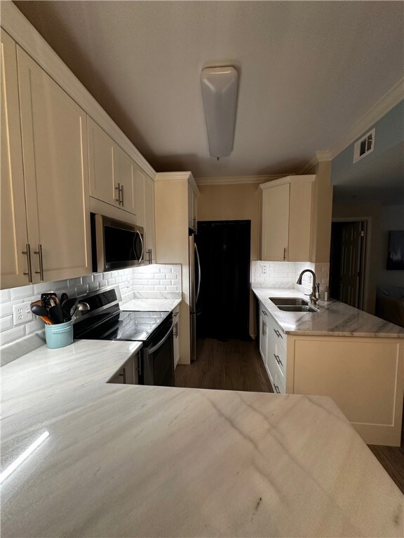 Kitchen showing door to pantry/laundry