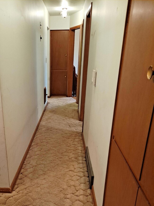 Hallway With 2 Linen Closets