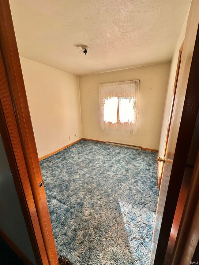Hardwood under the carpet.