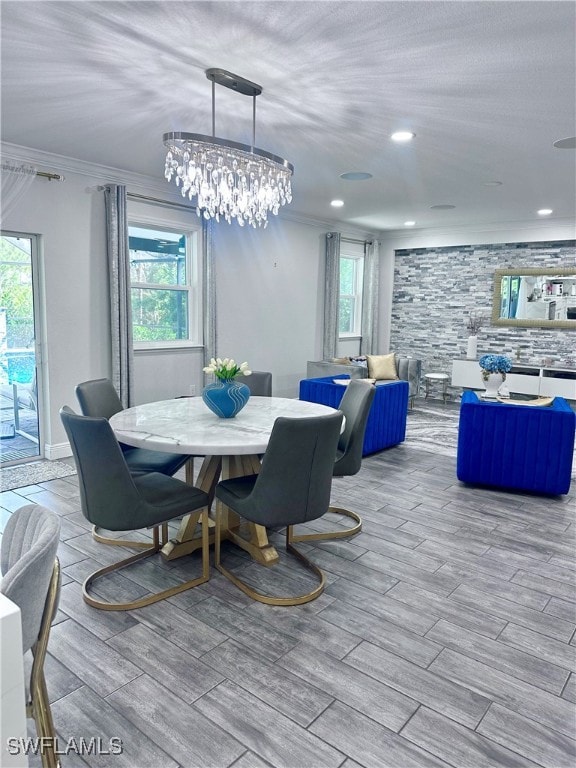 Dining room with crown molding and plenty of natur