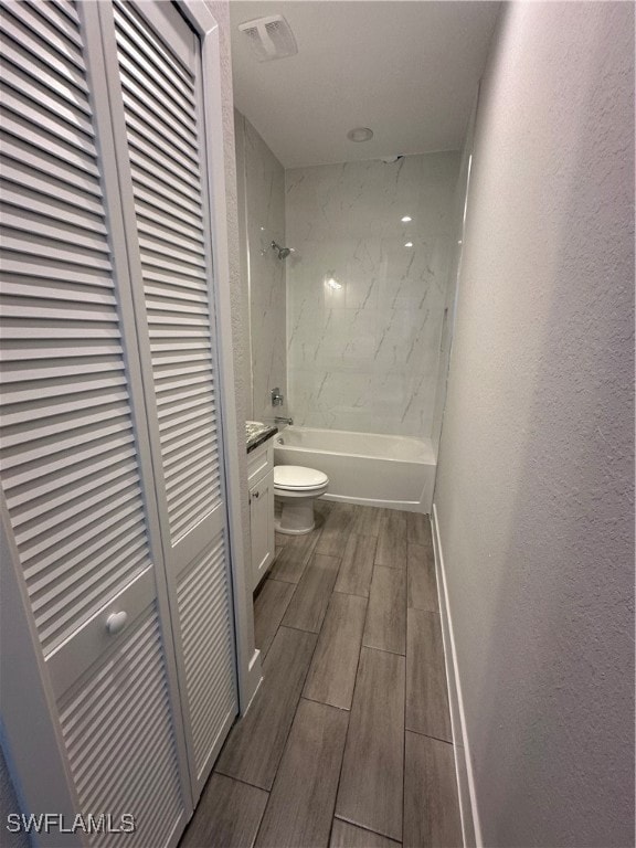 Full bathroom featuring vanity, tiled shower / bat