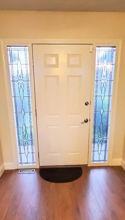 Front Entrance to Home With Side Lights