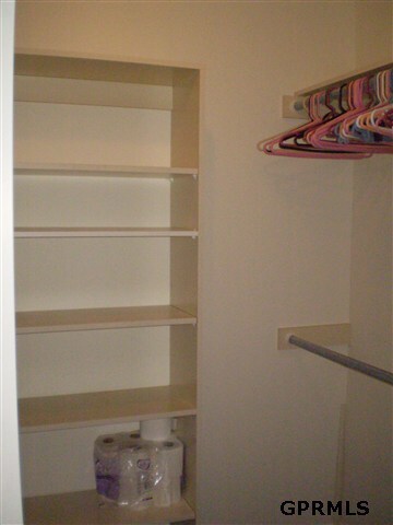 master suite has large walk in closet with pocket door.