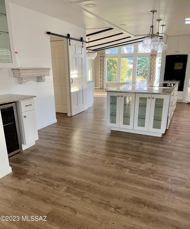 Family to Kitchen to View Windows