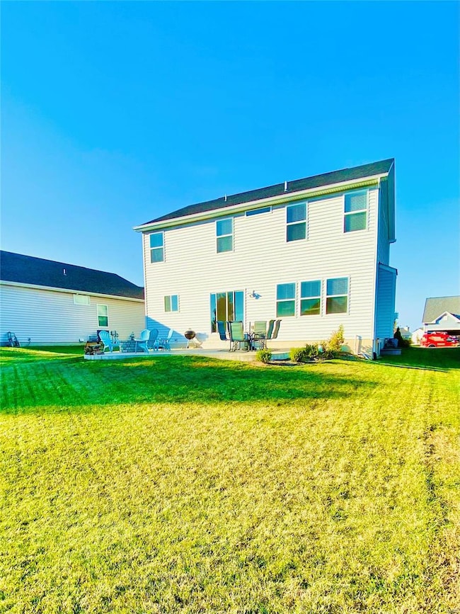 Large backyard that backs to some common ground.