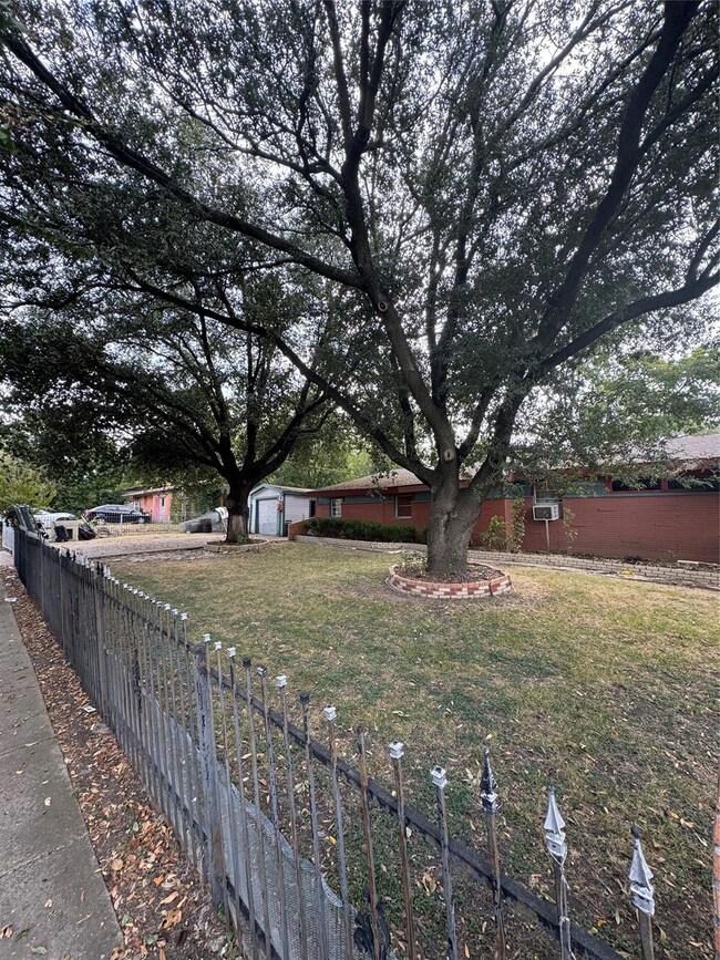View of front of property with a front yard